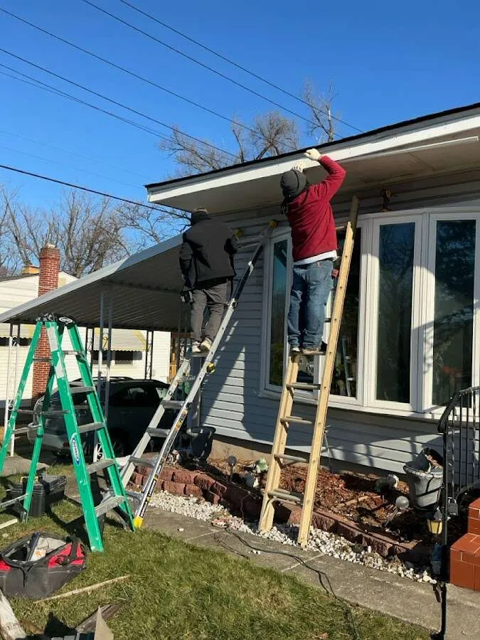 Restoration crew performing exterior repair in Somers